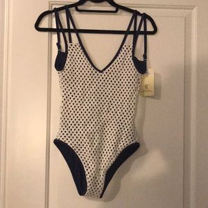 One piece swimsuit. Brand new. Tags still on.
